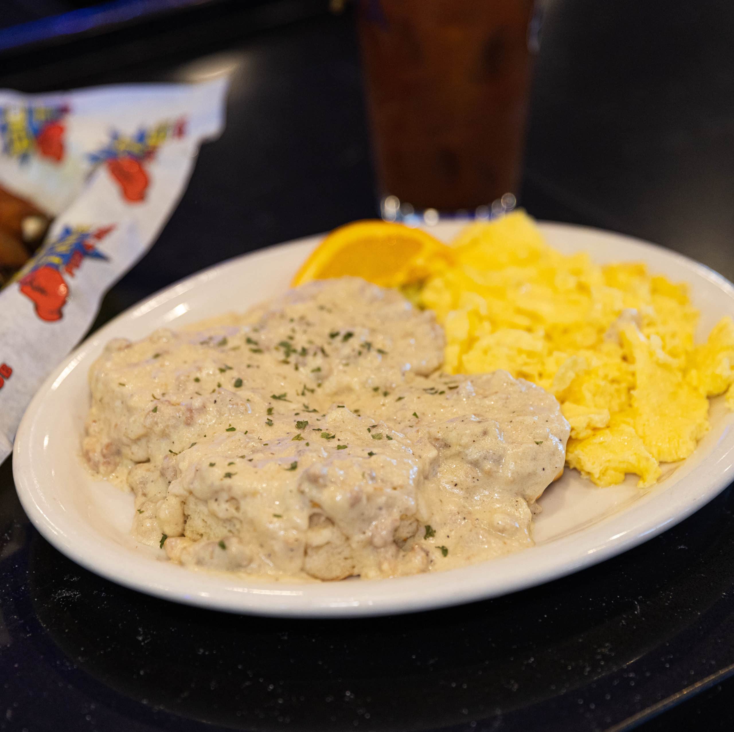 Biscuits topped our our house made sausage gravy. Served with two eggs any style.